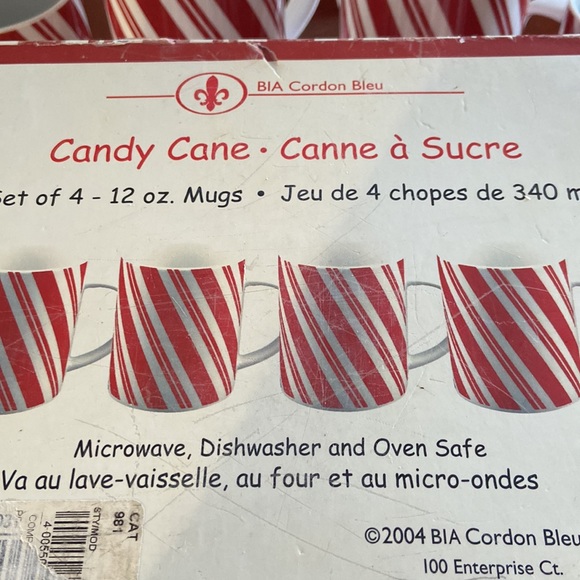 Set of four Christmas candy cane mugs. - Picture 2 of 2